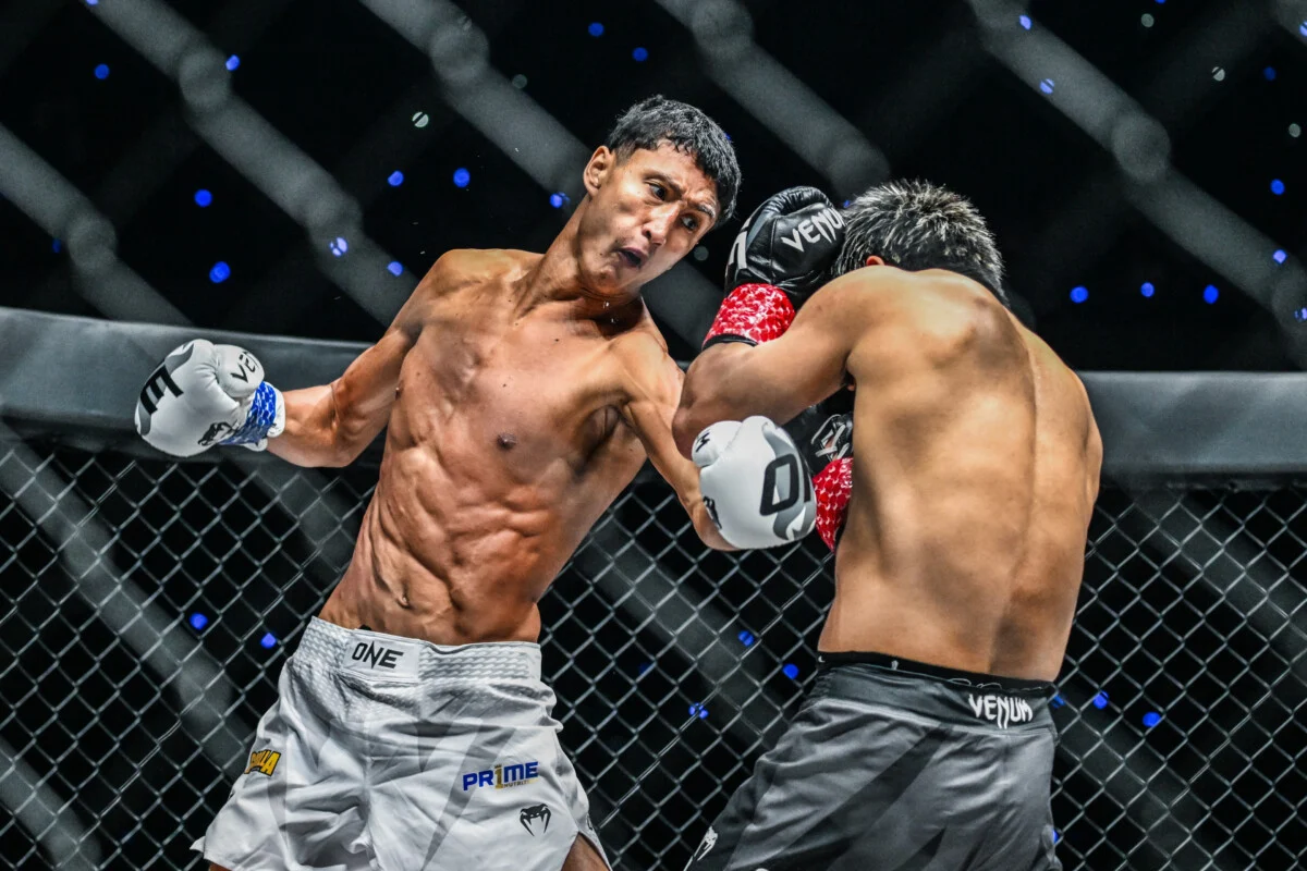 Nabil Anane connects with a body shot against Yuki Yoza at ONE SAMURAI 4.