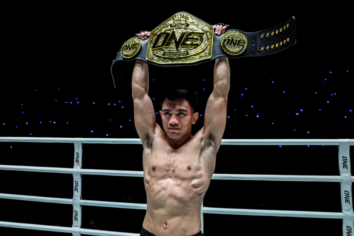 Joshua Pacio celebrates his title victory over Mansur Malachiev at The Inner Circle 21